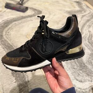 Louis Vuitton Women's Sneakers in Black and Gold